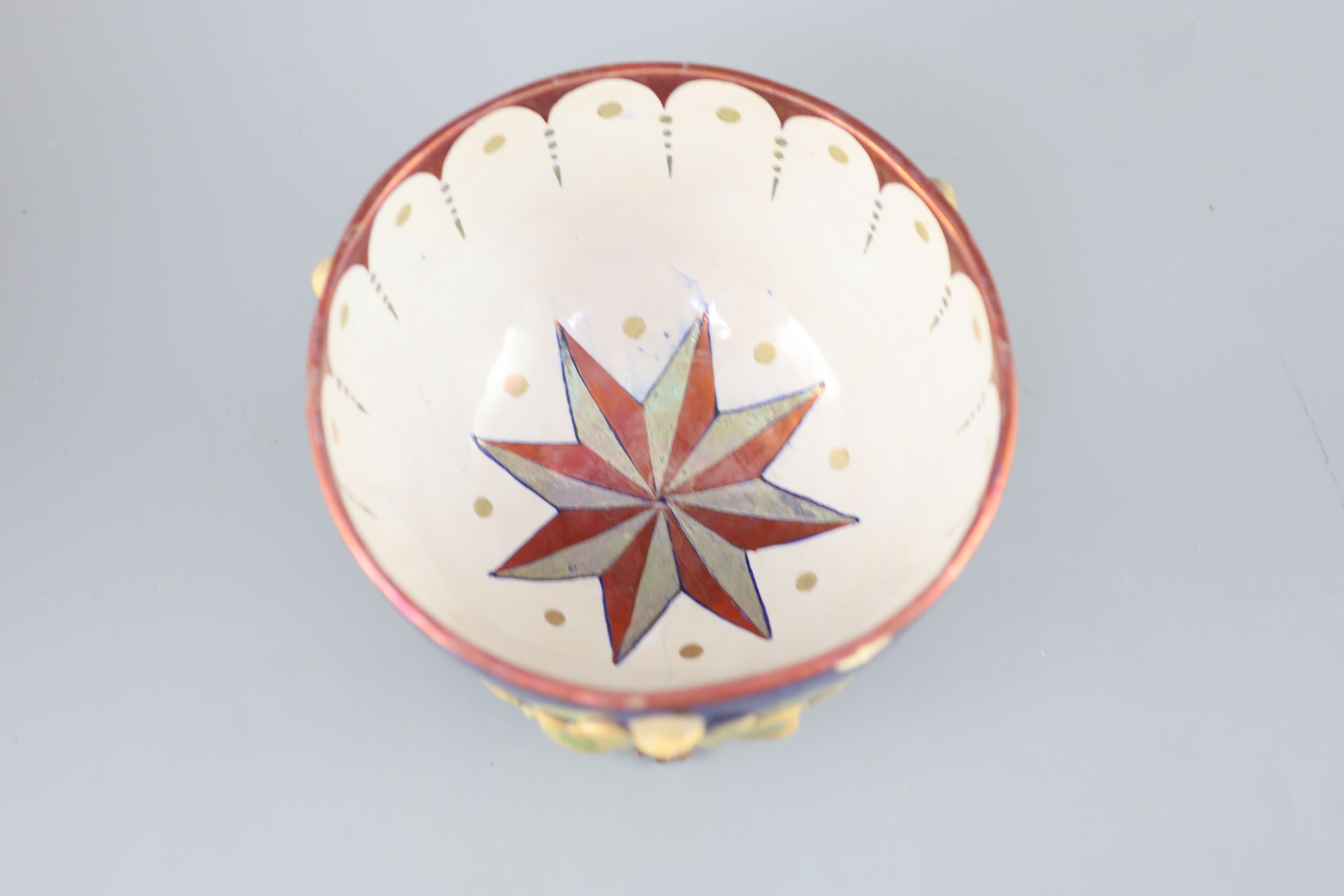A rare William De Morgan lustre bowl, c.1890, decorated by A. Farini,